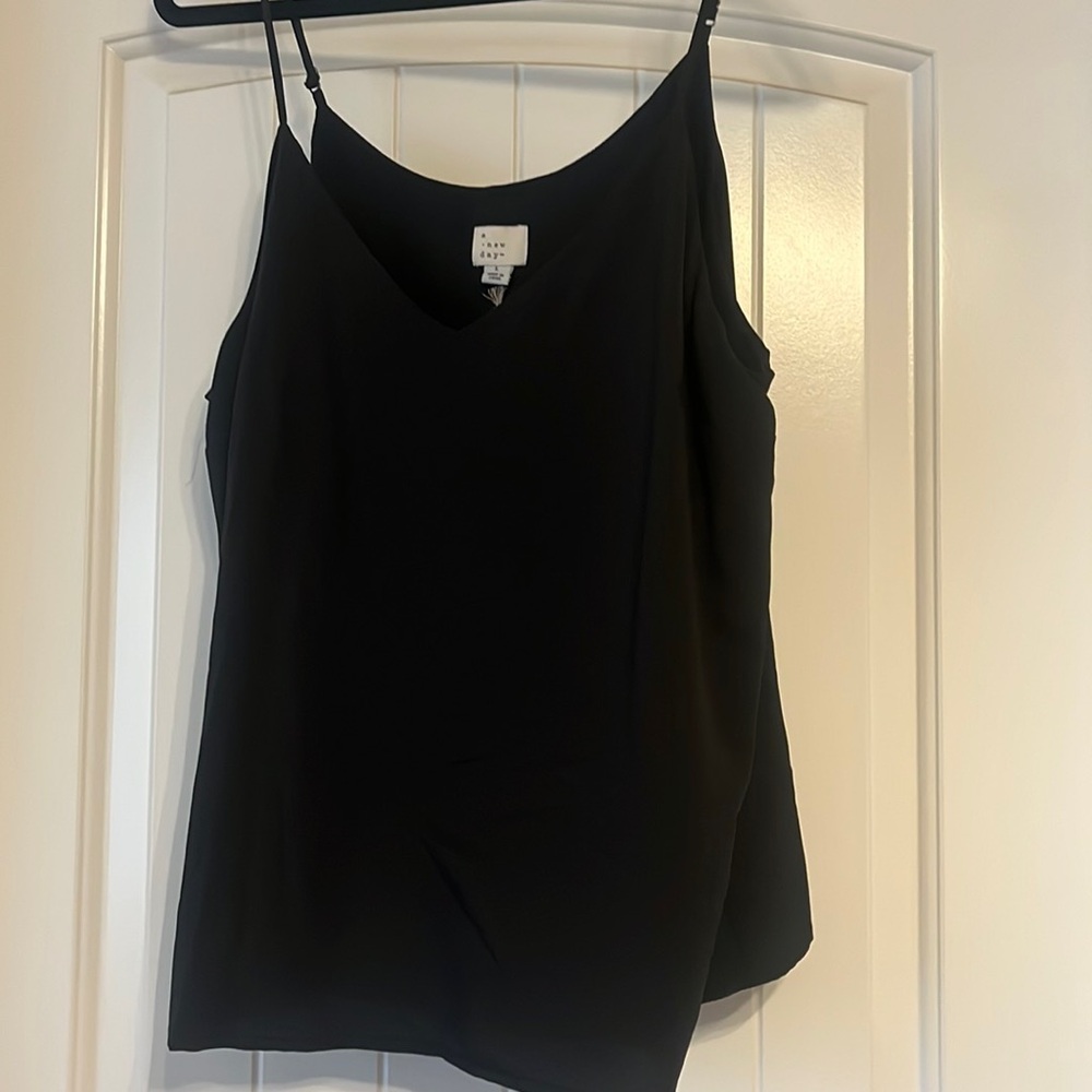 Light weight tank top with built in camisole underneath and adjustable straps